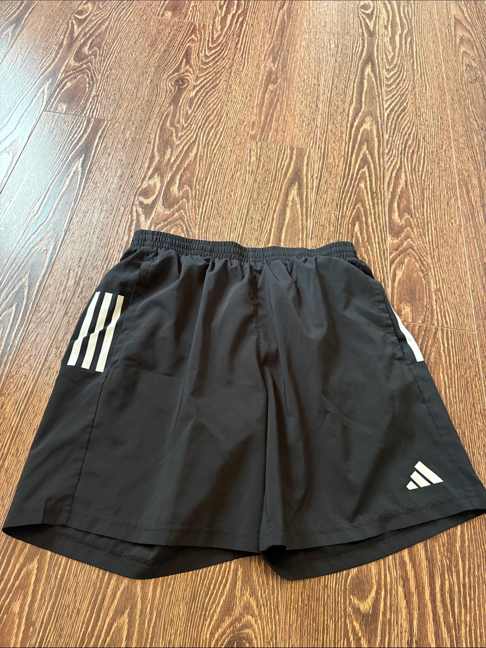 adidas Black Athletic Shorts with White Three-Stripe Accents